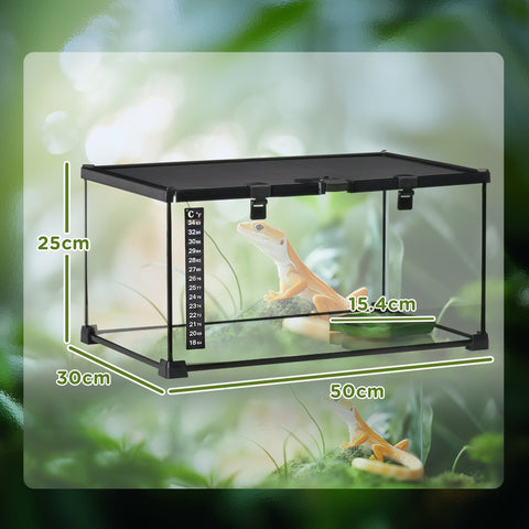 Black-framed glass reptile box terrarium with clear sides and strip patch thermometer for lizard substrate heater use