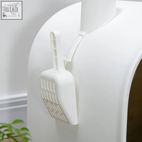 White plastic cat litter scoop with grid blade and handle attaches to pawhut cat litter box for easy cleaning