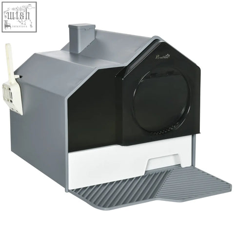Black and gray pawhut hooded cat litter box with front entrance drawer pan and white scoop attached for easy cleaning