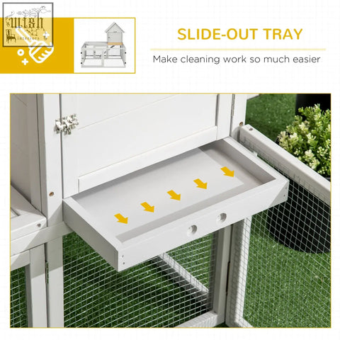 White slide-out tray with yellow arrows in pawhut indoor rabbit hutch with steel wire lockable doors light grey