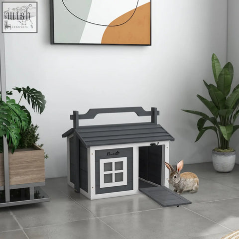 Gray and white plastic pawhut indoor rabbit hutch with openable roof, small window, easy access entrance ramp