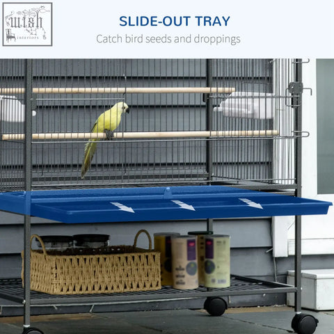 Blue slide-out tray with white arrows in pawhut large bird cage for easy cleaning of bird droppings and food containers