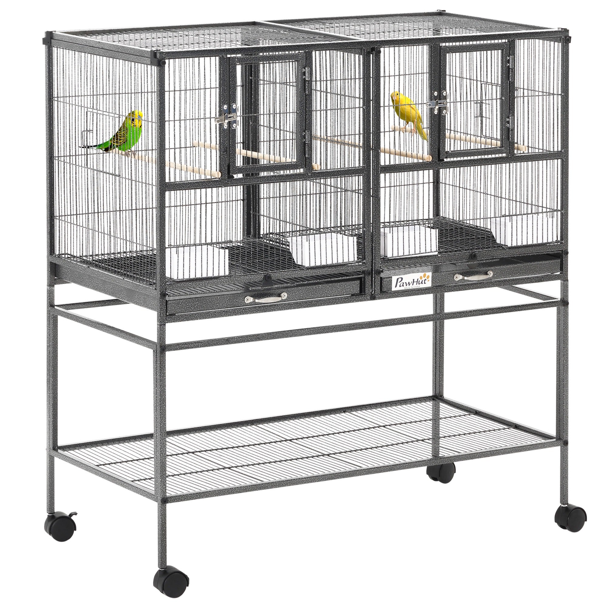 Black metal bird cage with two compartments housing green and yellow parakeets with slide-out metal trays and plastic food containers