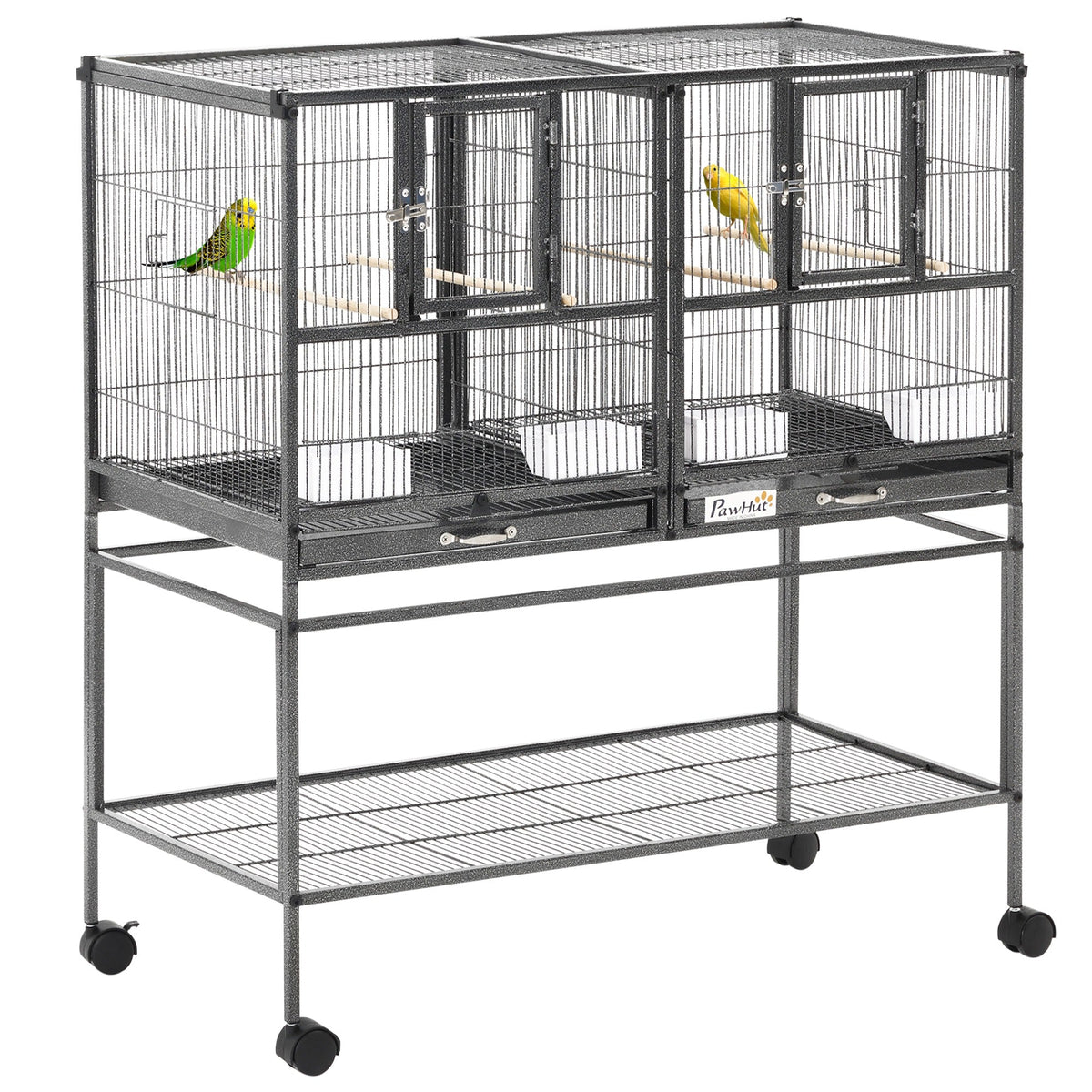 Black metal bird cage with two compartments housing green and yellow parakeets with slide-out metal trays and plastic food containers