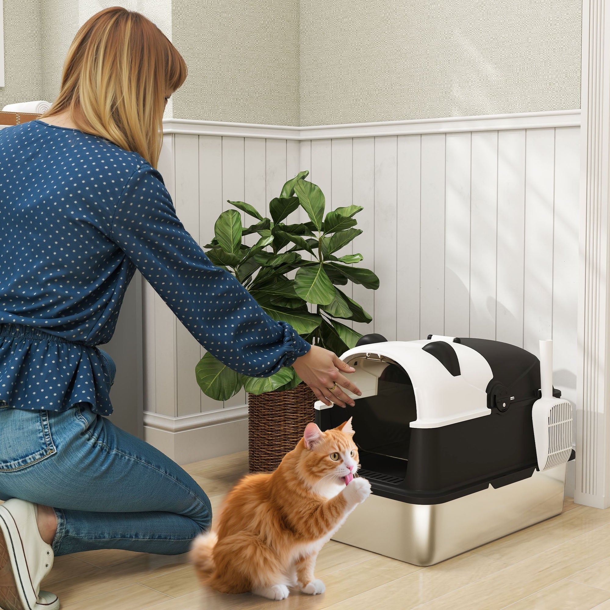 Sleek black and white panda themed stainless steel cat litter box with lid and self cleaning feature for easy use