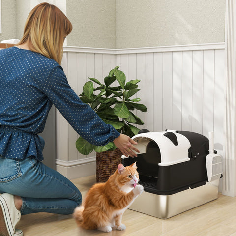 Sleek black and white panda themed stainless steel cat litter box with lid and self cleaning feature for easy use