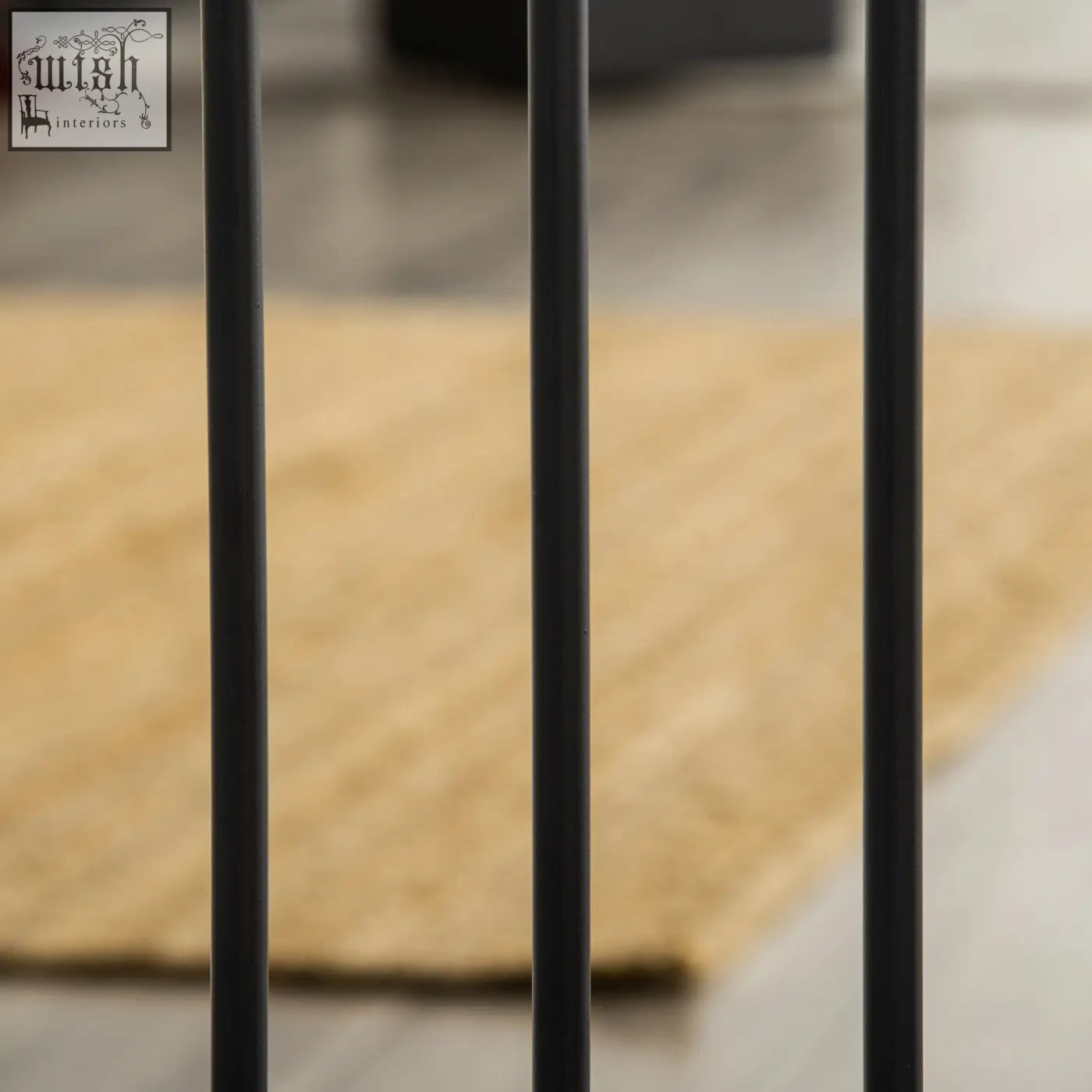 Black metal vertical bars of pawhut pet gate with cat door for safely blocking staircases and doorways