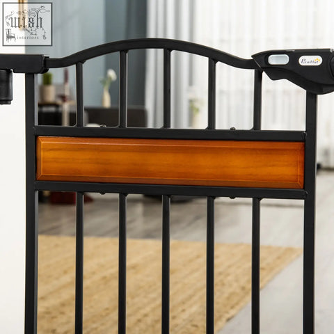 Black metal pawhut pet gate with warm brown wooden panel and cat door for staircases and doorways