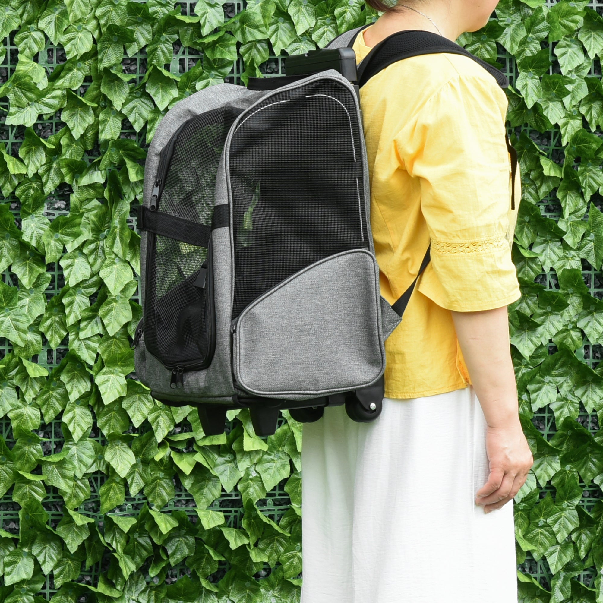 Pawhut gray and black dog carrier backpack made of oxford cloth with mesh sides, front pocket, wheels for easy movement