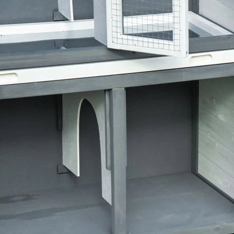 Gray plastic pawhut rabbit hutch with white mesh window and arched entrance 39w x 45h outdoor wooden cage