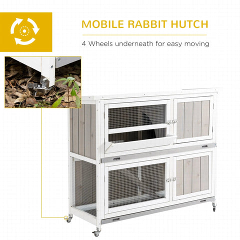 White pawhut rabbit hutch with gray panel doors mesh wire sides wheels for easy mobility and wet weather use