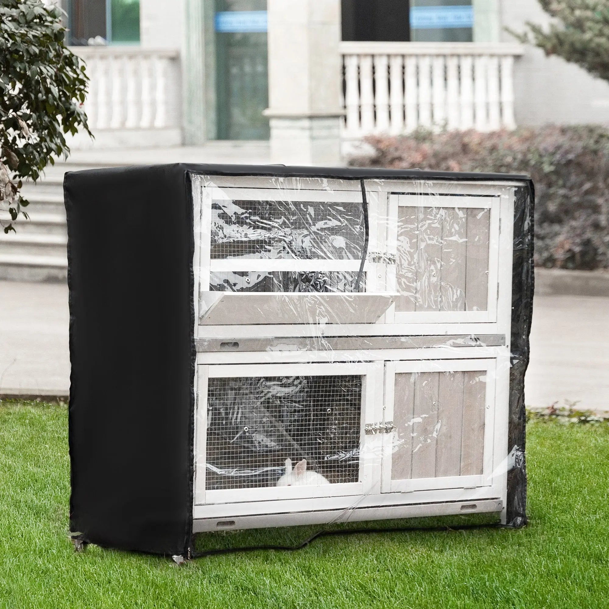 Black protective cover on pawhut fir wood rabbit hutch with clear windows and wire mesh for wet weather use