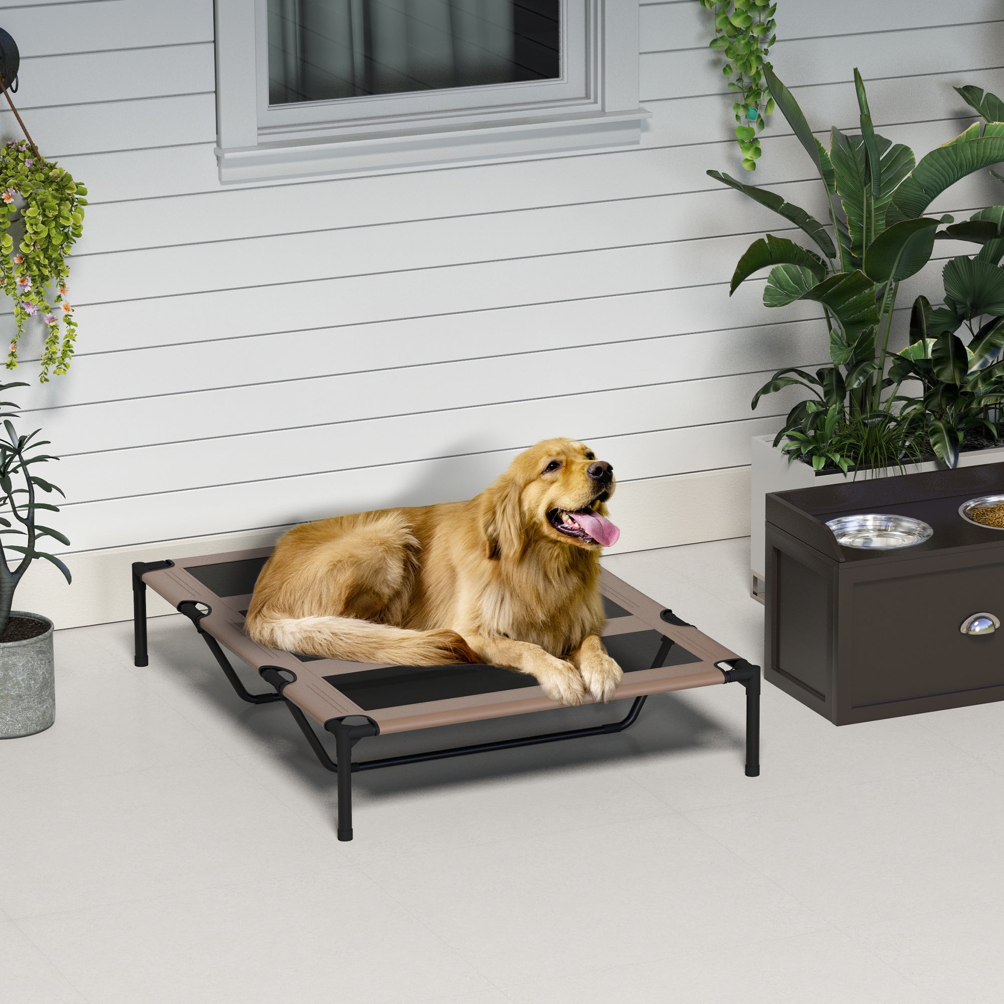 A golden retriever lounges on a brown pawhut raised dog bed with breathable mesh that lets air flow indoors and outdoors