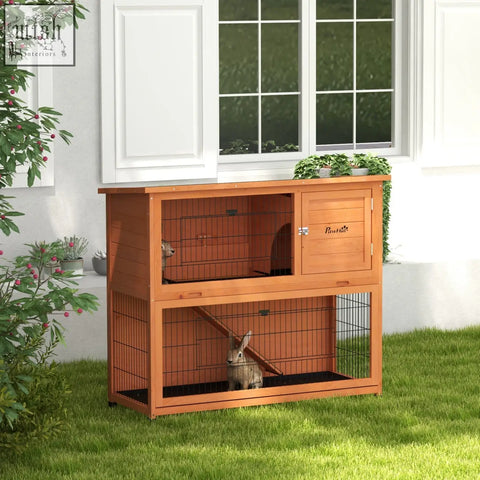 Pawhut two-tier antiseptic wood rabbit hutch in orange with steel wire panels and cabinet door main house design