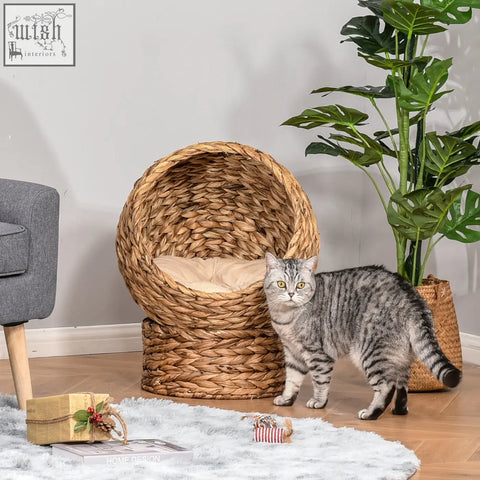 Brown pawhut wicker cat bed with cylindrical base and soft beige cushion for a cozy cat house lounging spot