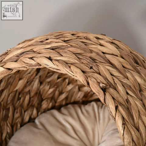 Brown pawhut wicker cat bed with woven natural straw, cylindrical base, and soft washable cushion for cats