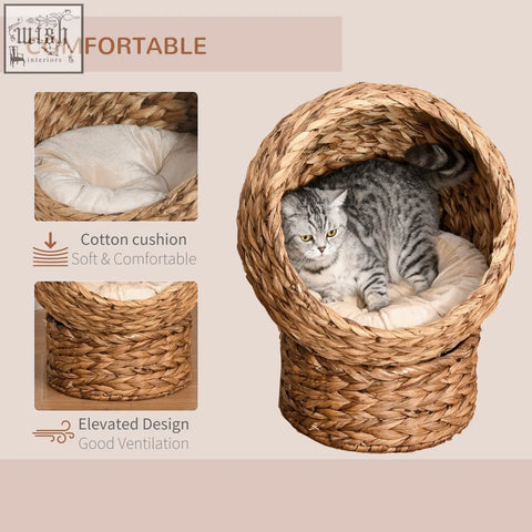 Pawhut wicker cat bed with cylindrical base made of brown woven rattan and a soft cream cotton cushion inside