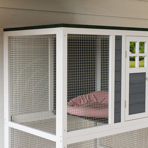 White metal wire cat cage with gray panel doors and pink cushion inside for pawhut outdoor cat enclosure