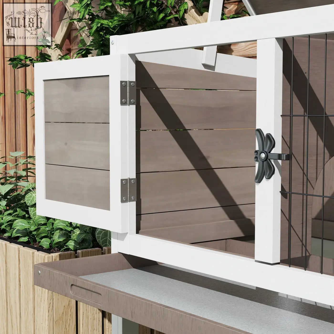 White-framed wooden guinea pig hutch with gray slatted door black metal latch and openable asphalt roof for small animals