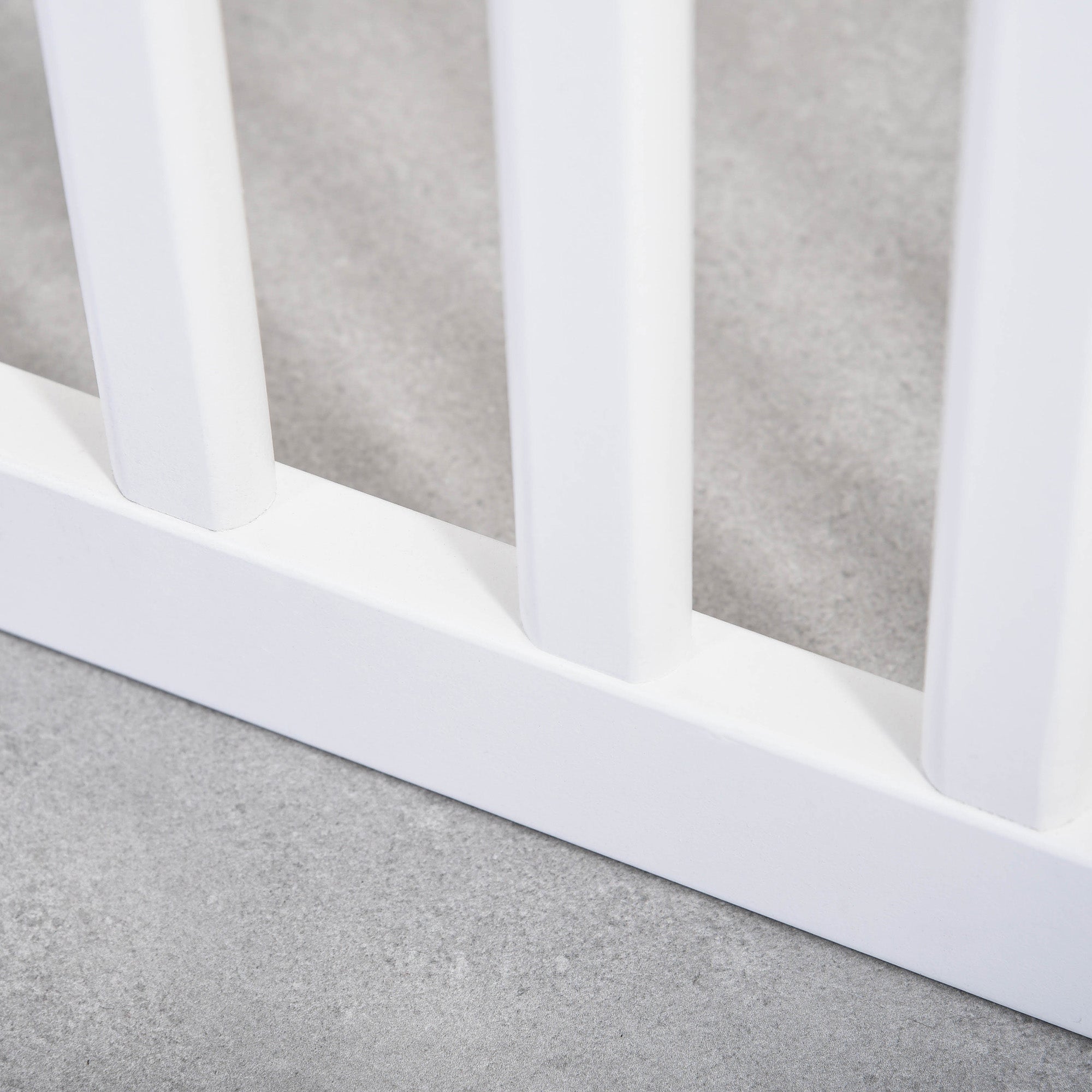 White plastic pet gate with vertical bars and rounded base for freestanding dog safety by pawhut
