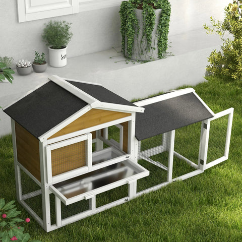 White and black wooden chicken coop with slanted roof wire mesh sides and sliding tray door for main house run area fresh air