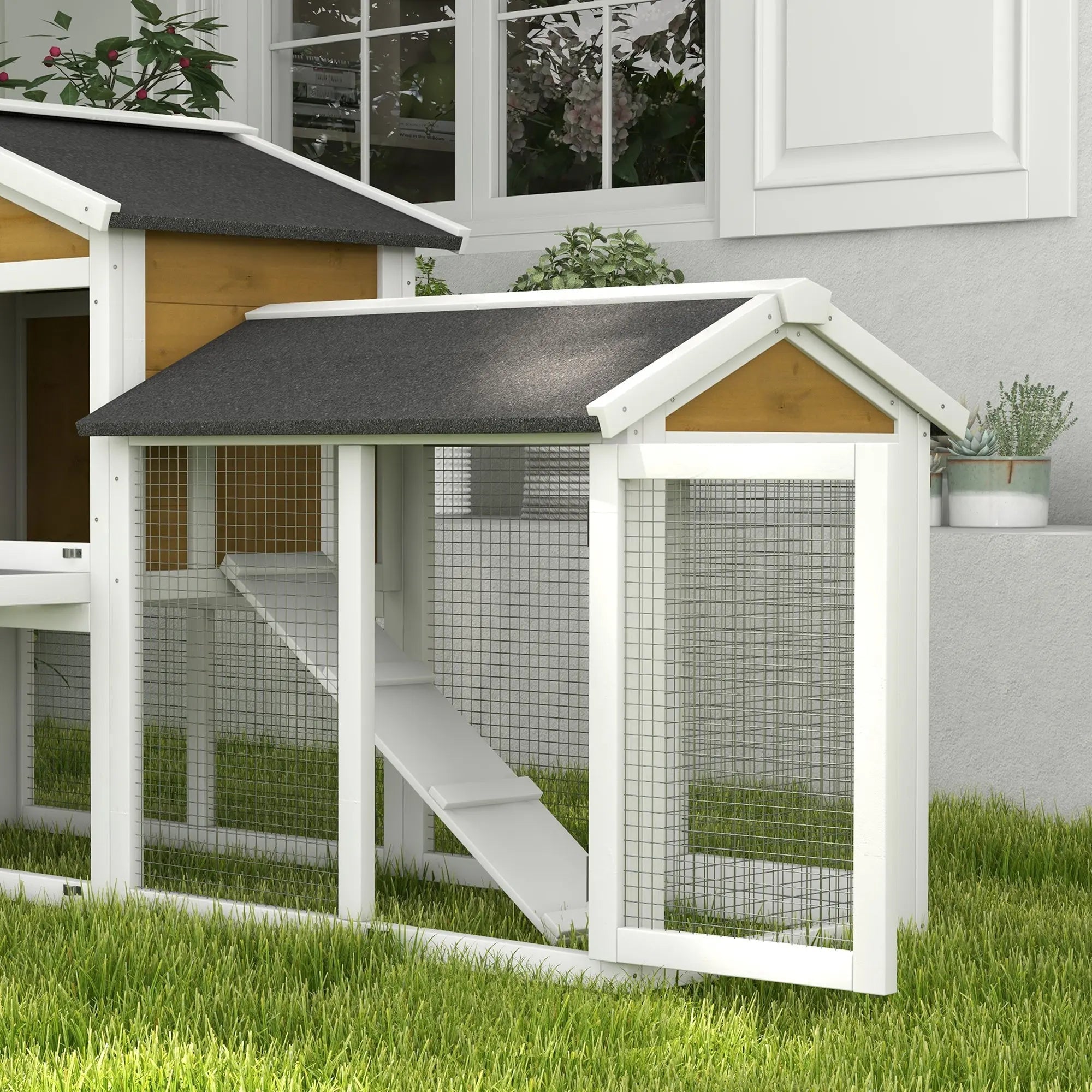 Pawhut wooden rabbit hutch with white and brown main house and run area featuring a black roof and fresh air mesh sides