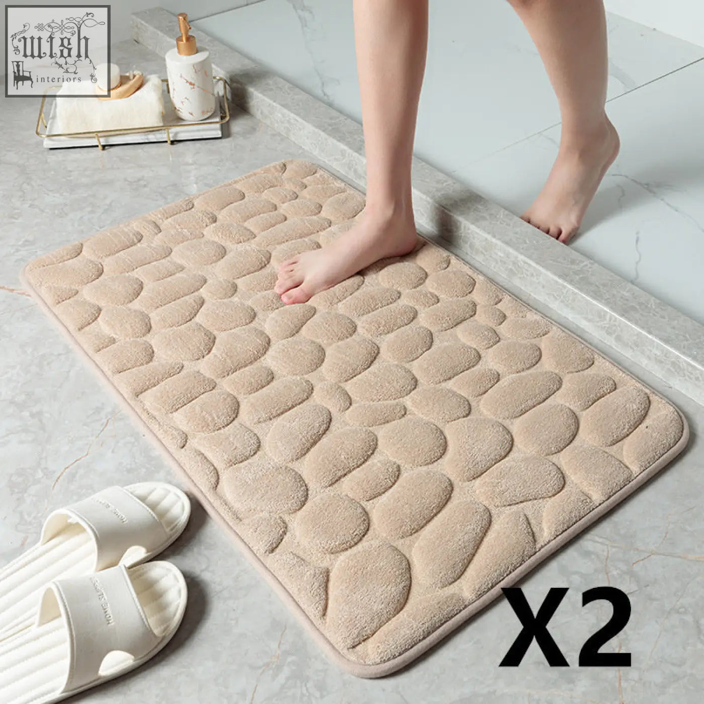 Beige pebble textured floor mat with soft memory foam material offering great water absorption and plush comfort
