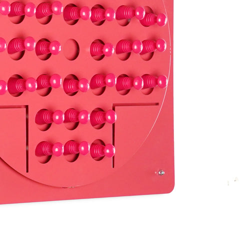 Vibrant pink plastic peg solitaire board with rows of pegs ideal for solo test and easy hanging instructions age range use