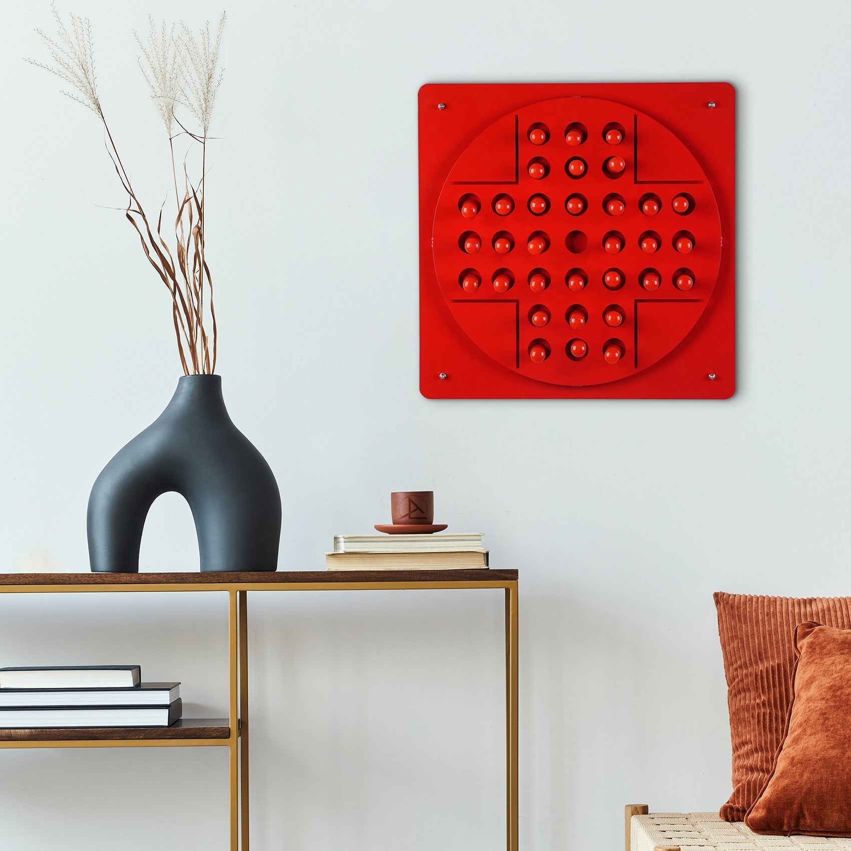 Red peg solitaire wall art with raised circular grid of dots perfect for solo test and all age range play