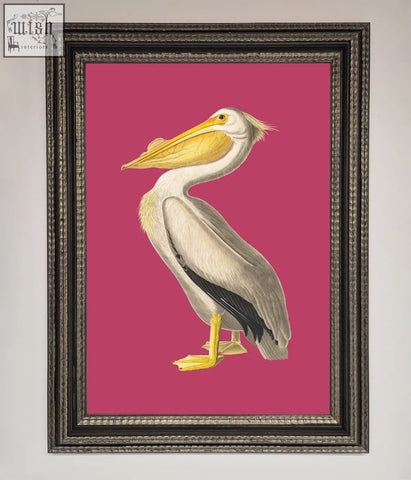 A pink framed poster featuring a detailed white pelican illustration with yellow beak and feet on magenta background