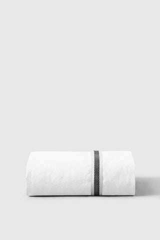 White cotton percale fitted sheet with a subtle black woven stripe running horizontally across the center