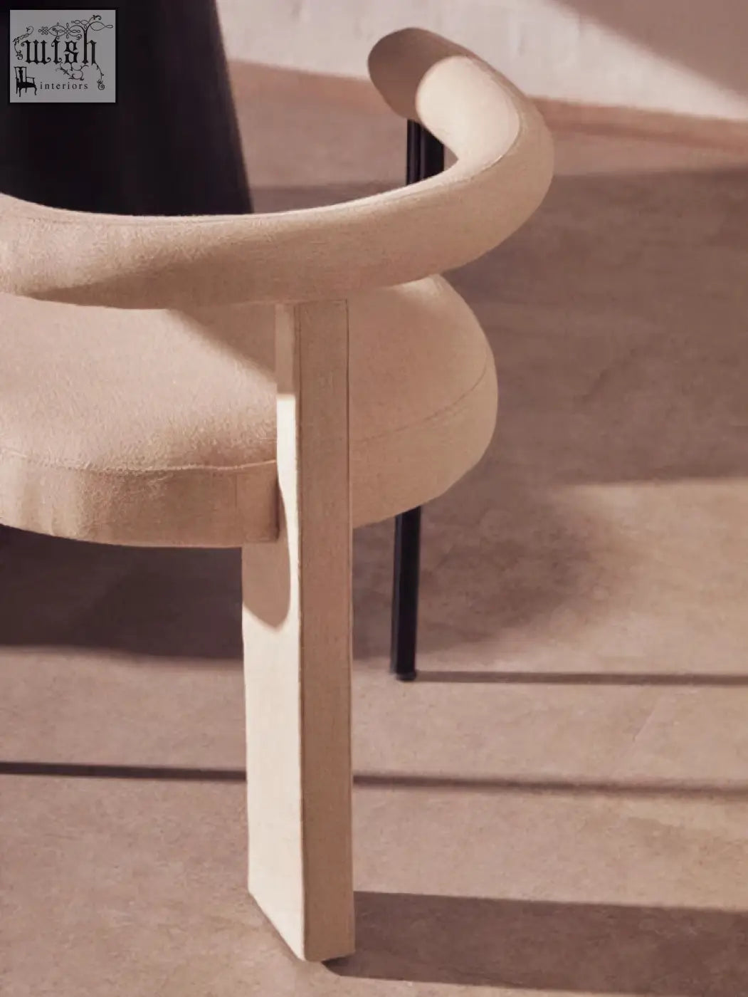 Cream texture linen perdoba cream texture dining chair with curved armrests and sleek black metal legs