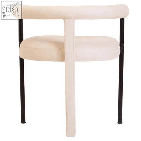Cream-colored perdoba cream texture linen dining chair with sleek black metal legs and modern minimalist design