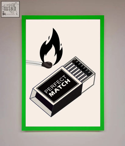 A perfect match framed print showing a black and white matchbox illustration with a lit match in a green frame