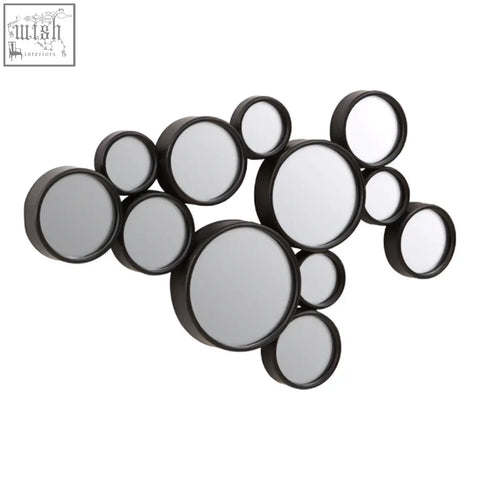 Persephone black multi circles wall mirror with black circular mirrors in varying sizes arranged in overlapping cluster