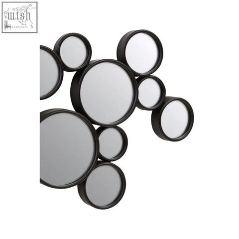 Persephone black multi circles wall mirror featuring black-framed circular mirrors in a clustered overlapping design