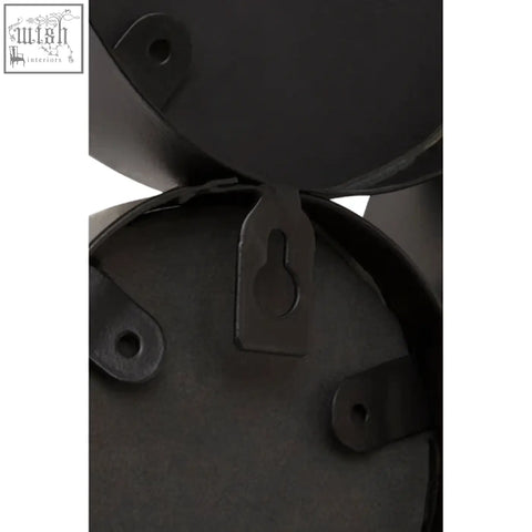 Back of persephone black multi circles wall mirror showing black metal circular container with keyhole latch and mounting holes