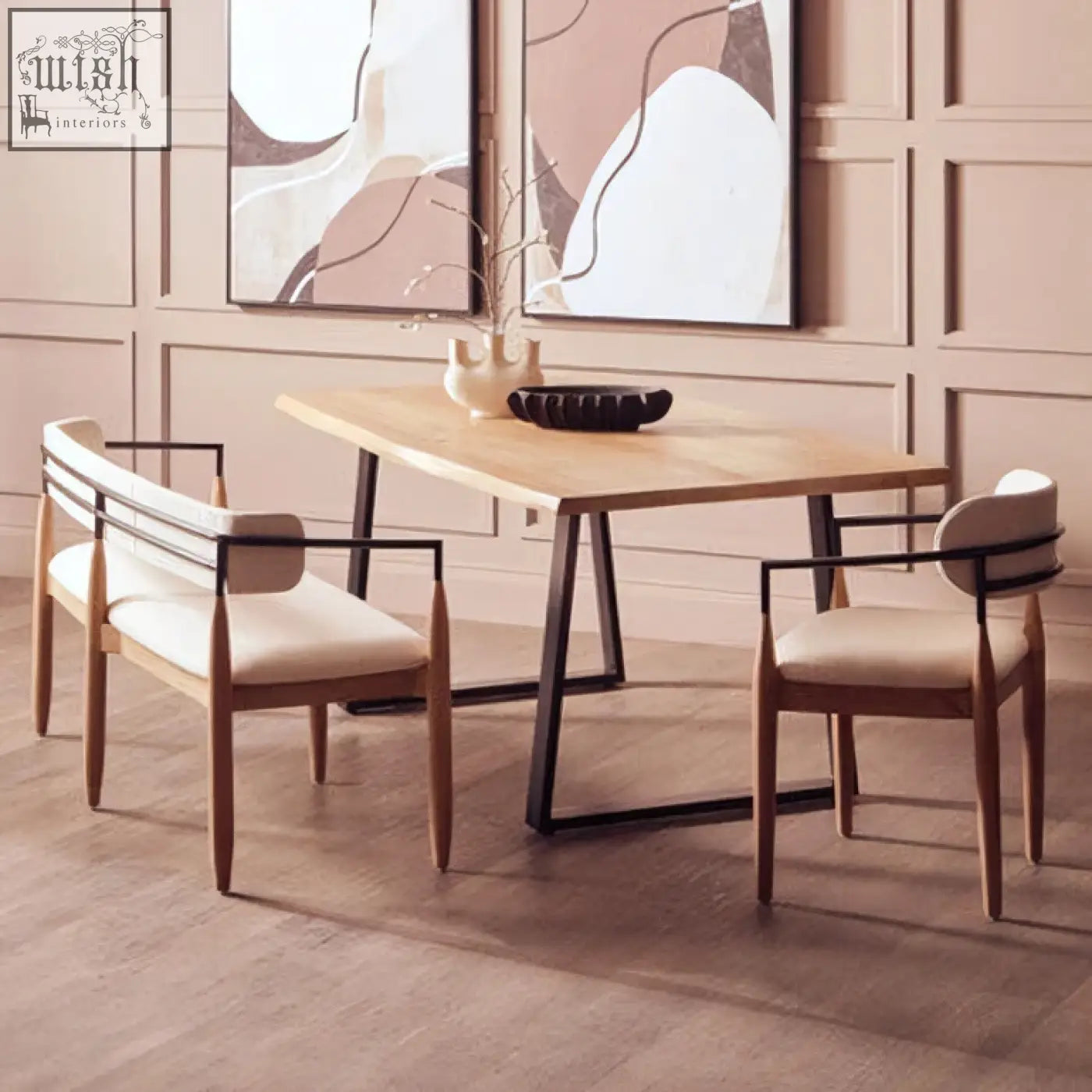 Light wood dining table with black metal legs featuring a mango wood live edge for a minimalist look