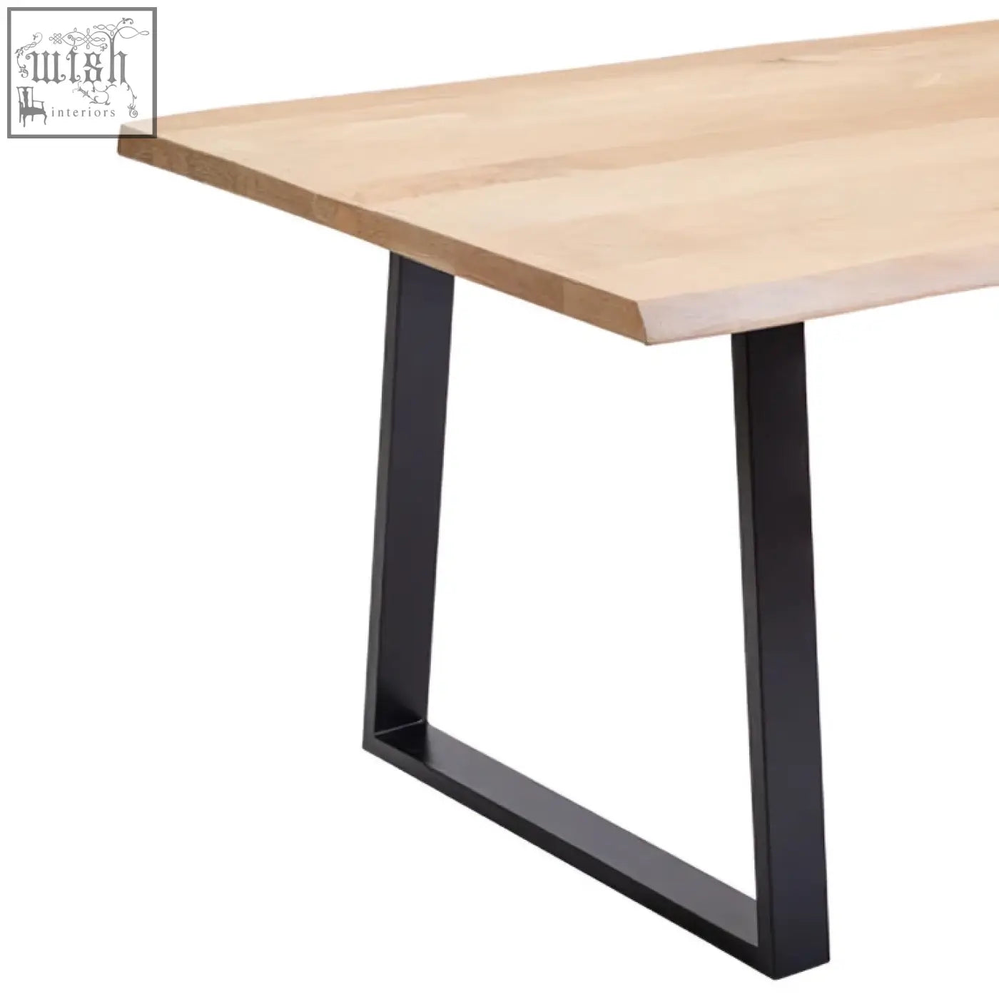 Light-colored mango wood live edge dining table with black metal legs and sturdy modern design