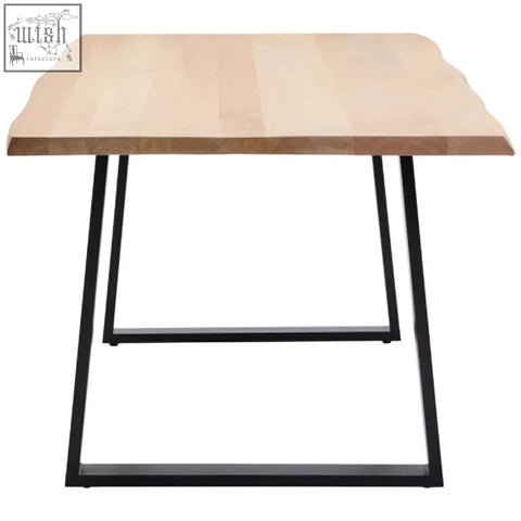 Light-colored mango wood live edge dining table with black metal legs perfect for stylish dining spaces