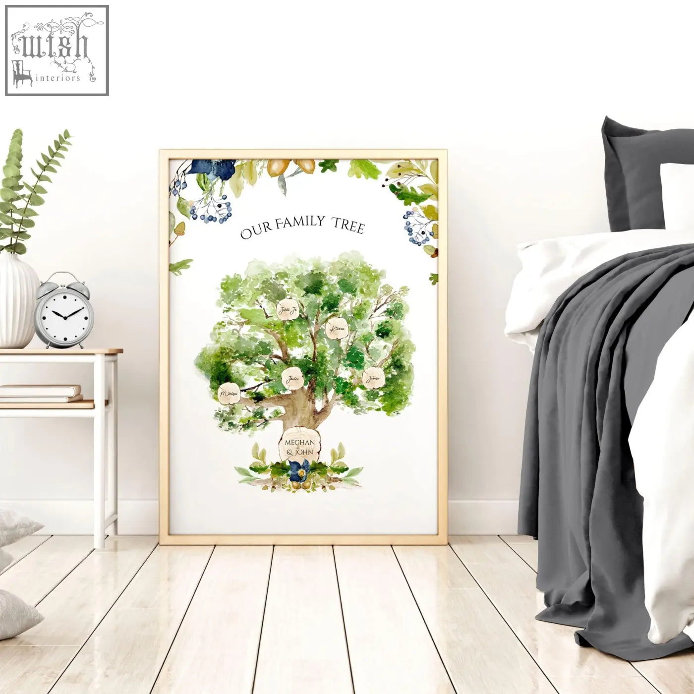 A framed personalised wall art family tree art print with green foliage and blue berries featuring name labels