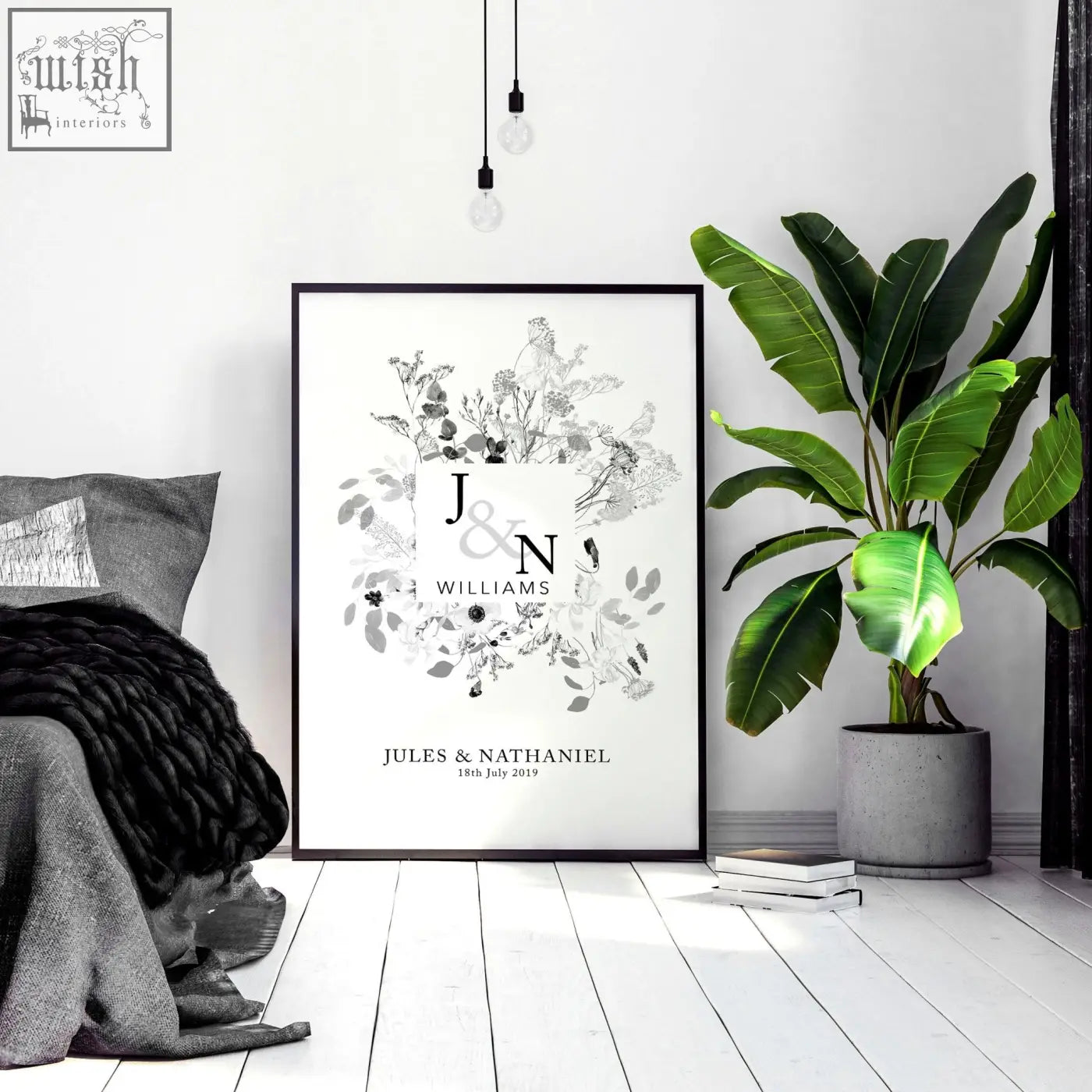 Black-framed wall art print with monogrammed initials and grayscale floral design perfect for personalised wedding anniversary gifts