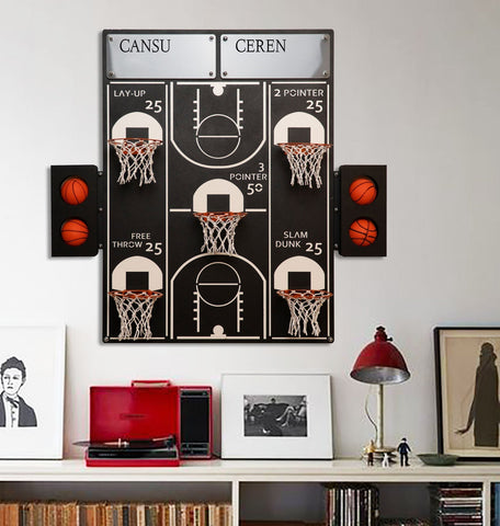 Black metal basketball wall scoreboard art with white markings and four orange balls in net hoops for all-star game