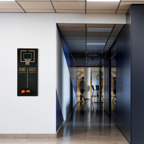 Personalized basketball wall game with black backboard, gold rim, and home guest orange balls target area mounted on wall