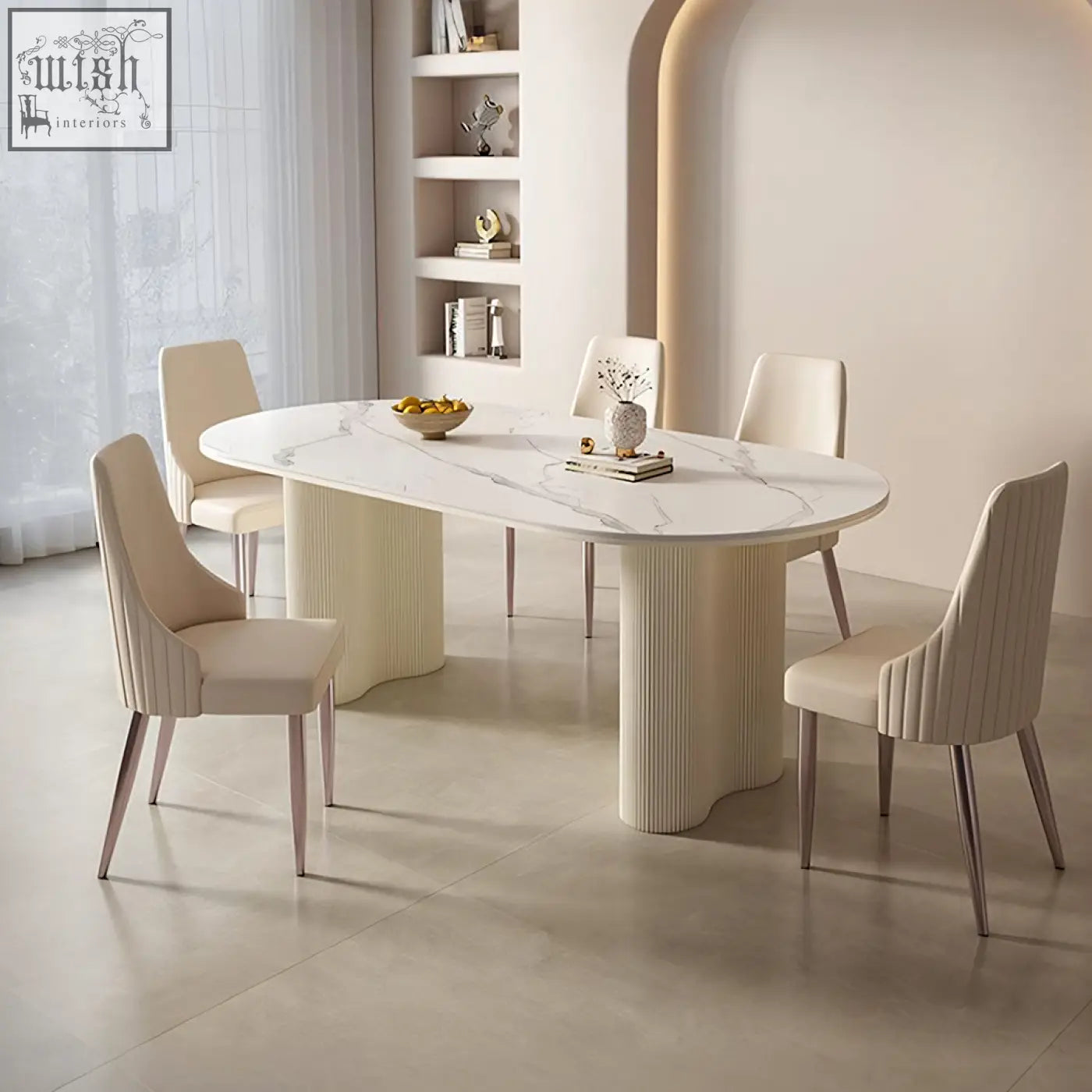 Modern oval dining table with white marble top and cream peru dining chair featuring ribbed pedestal legs
