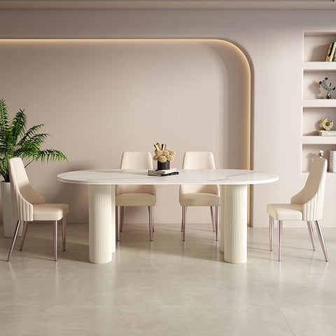 White marble oval peru dining table with fluted cylindrical legs perfect for stylish dining spaces