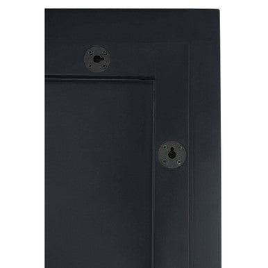 Back of petillo thick silver frame large rectangular wall mirror showing black metal cabinet door with two keyholes