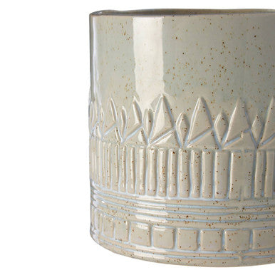 Cream-colored ceramic petra small planter with speckled finish and embossed geometric patterns small planter
