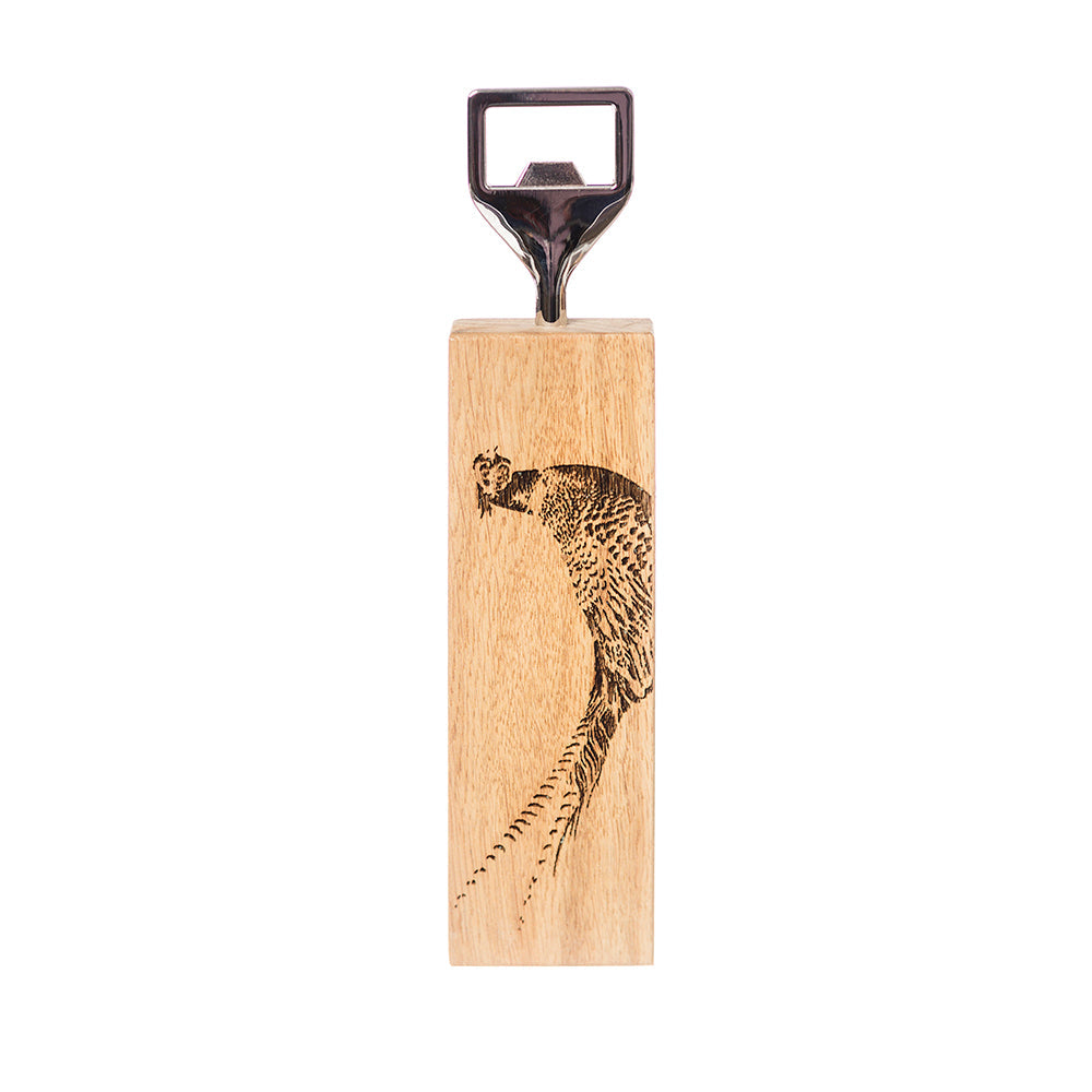 A sleek light-colored oak bottle opener with a detailed engraved pheasant design perfect for opening bottles