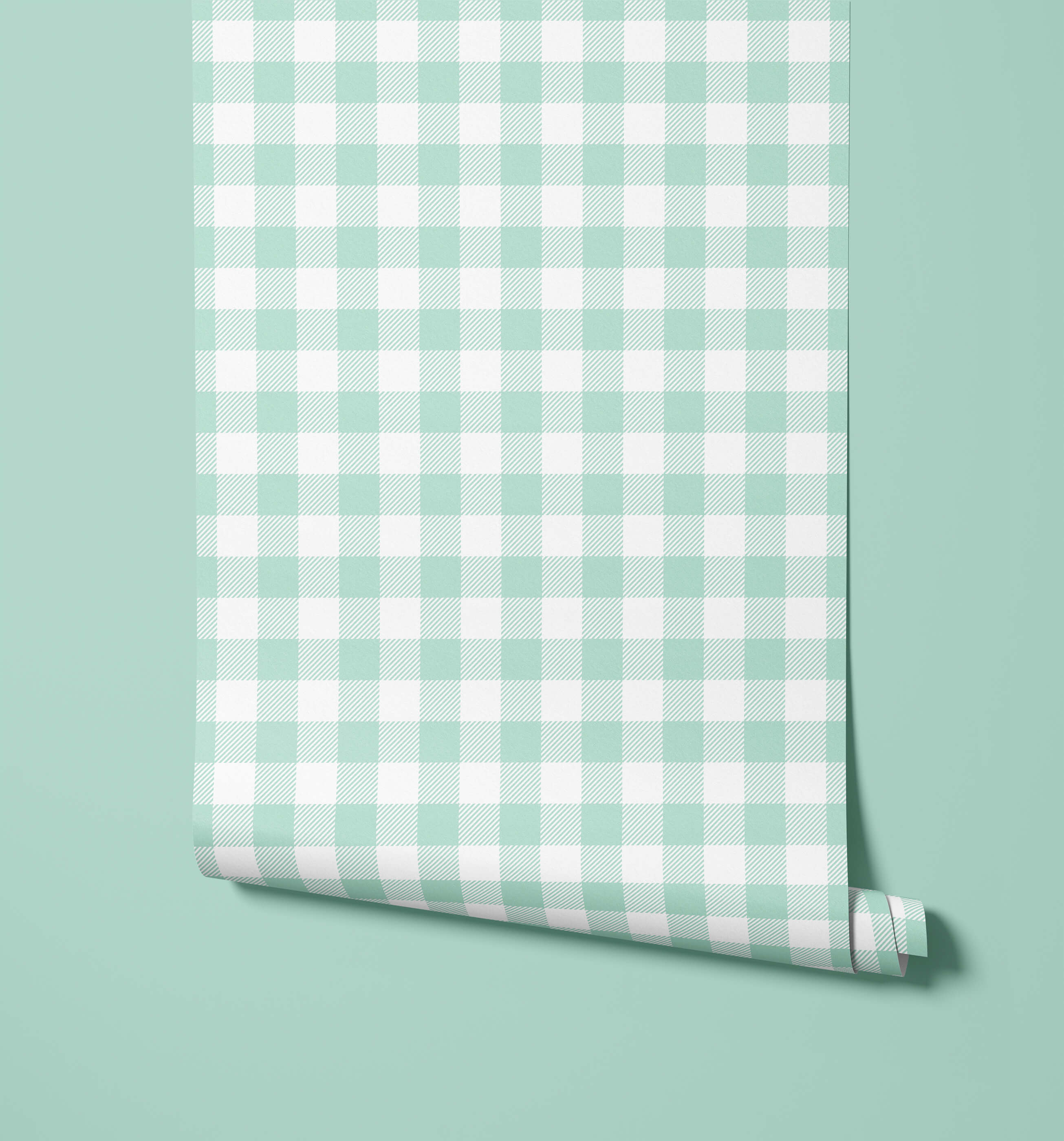 A roll of mint green and white gingham wallpaper called picnic perfect for a fresh, classic wall decor look
